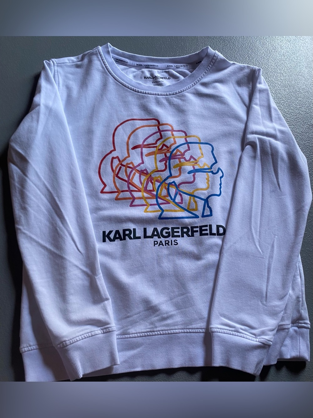 Karl Lagerfeld Paris sweatshirt stacked graphic of the designer's silhouette